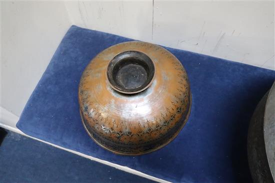 An 18th/19th century Persian tinned copper bowl, 15.25in. and 12.25in.